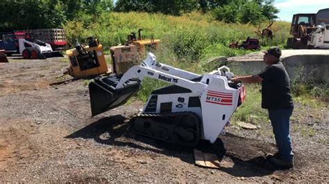 how to operate a mini skid steer|bobcat mt 55 walk behind.